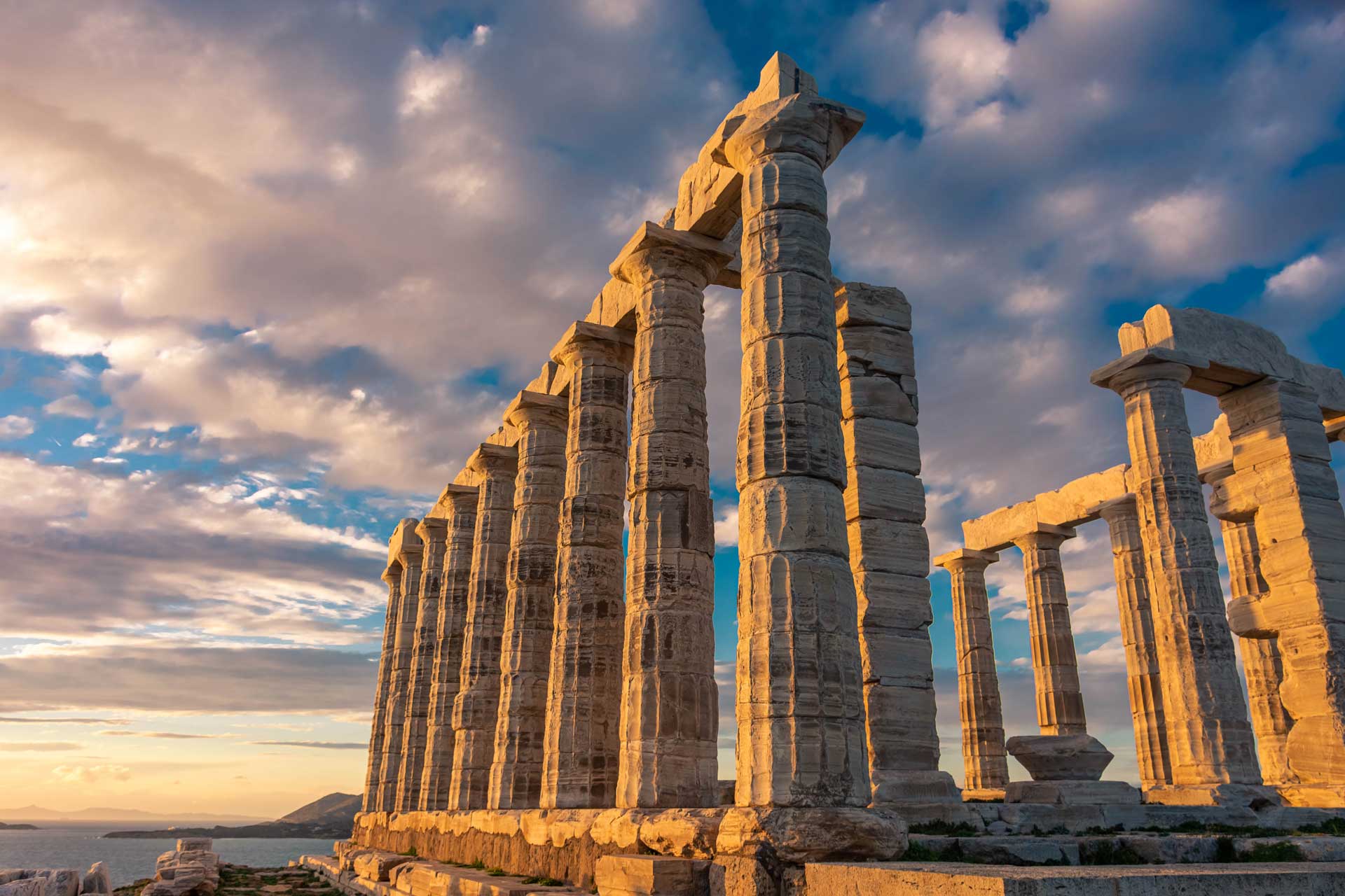 Sunset at Cape Sounion Temple of Poseidon during a private tour from Athens